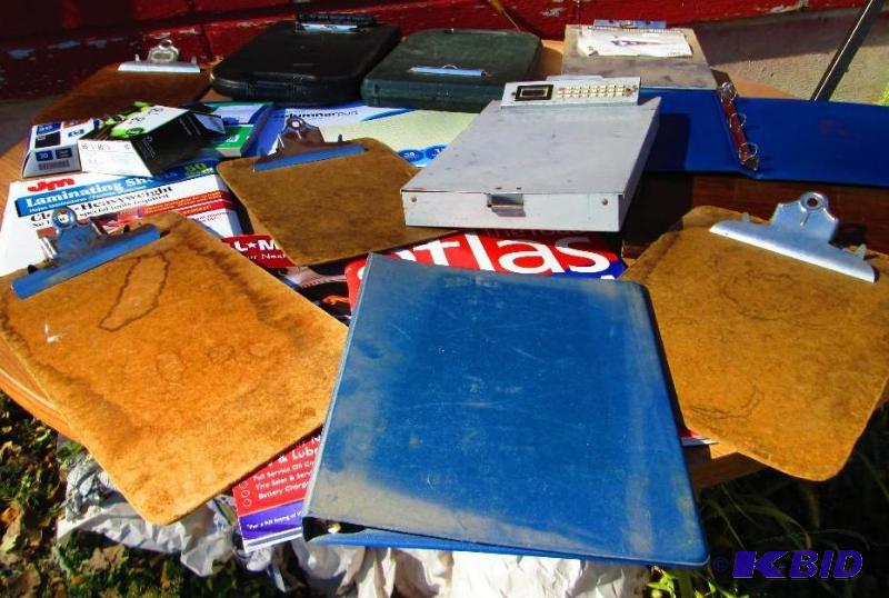 Lot of assorted clip boards, binders, ledger ...