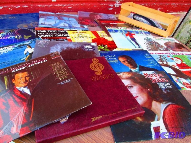 Wood bin of assorted vinyl records, some are ...