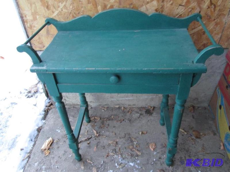 Antique wood table, painted greenn. One of th...