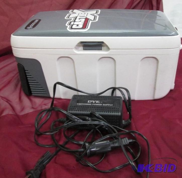 Electric cooler plugs into wall or car plug p...