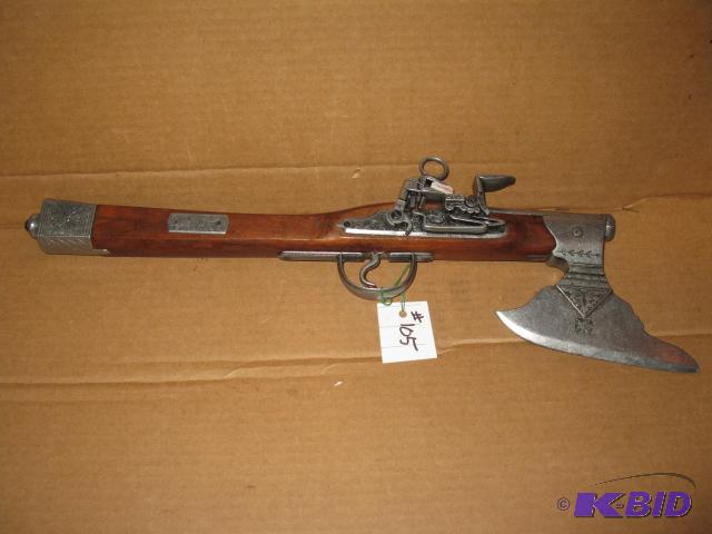 lot 105 image: Hatchet pistol, 21 inches, new in box, heavy ...