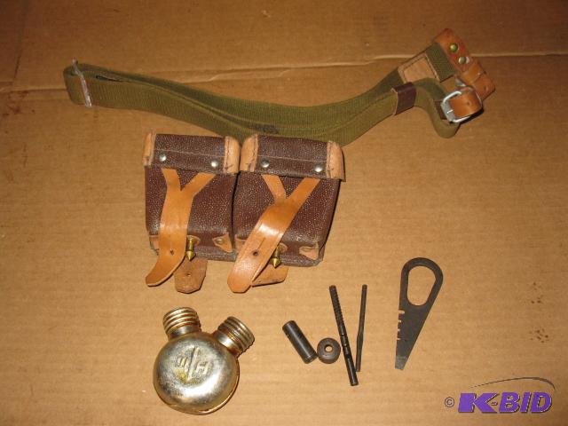 lot 128 image: Military belt and supplies...