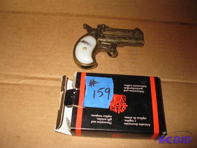 lot 159 image: Replica Derringer with white handle, new in b...