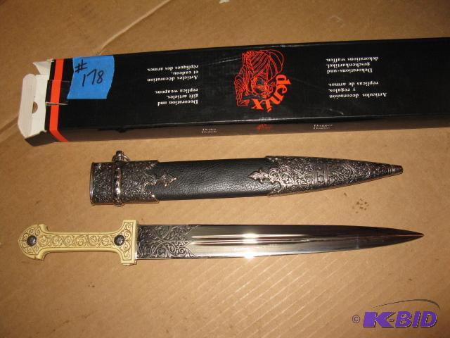 lot 178 image: Replica knife with engraved blade and black m...