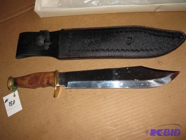 lot 180 image: knife in leather sheath, new in box, 17 inch...