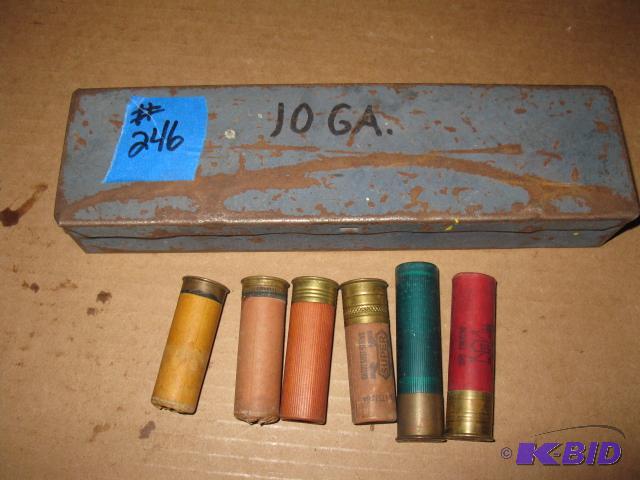 lot 246 image: Qty 6- 10 ga shells in a metal container, fun...