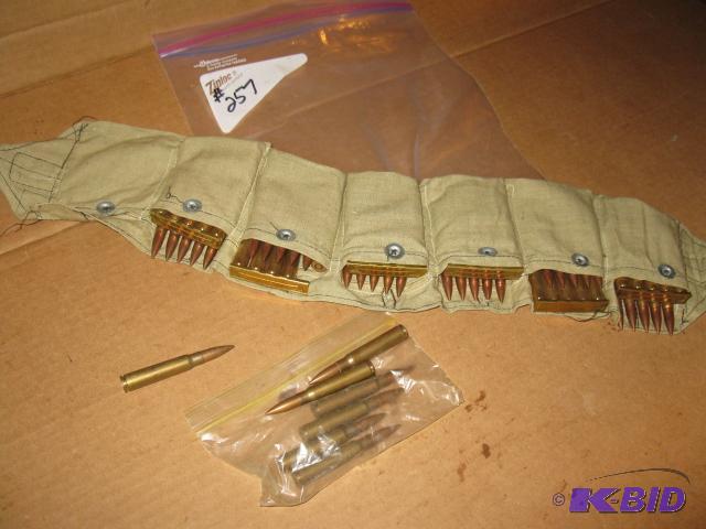 lot 257 image: Approx 60 rounds in military bandolierpouche...