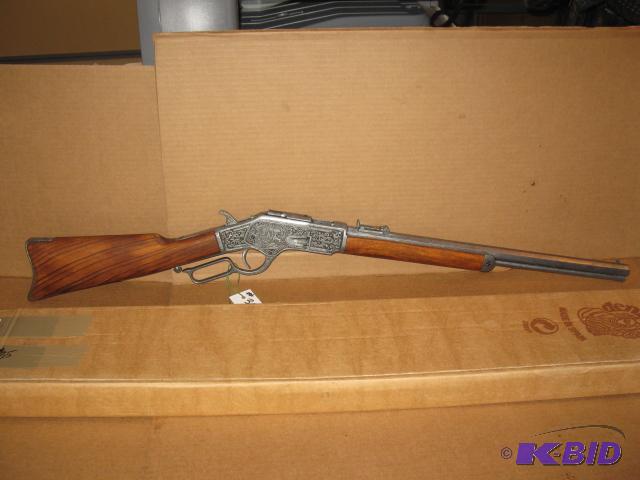 lot 35 image: Lever Action rifle replica M1873. Metal and w...