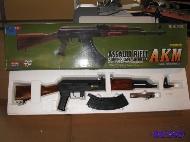 lot 45 image: AKM Airsoft rifle, new in package...