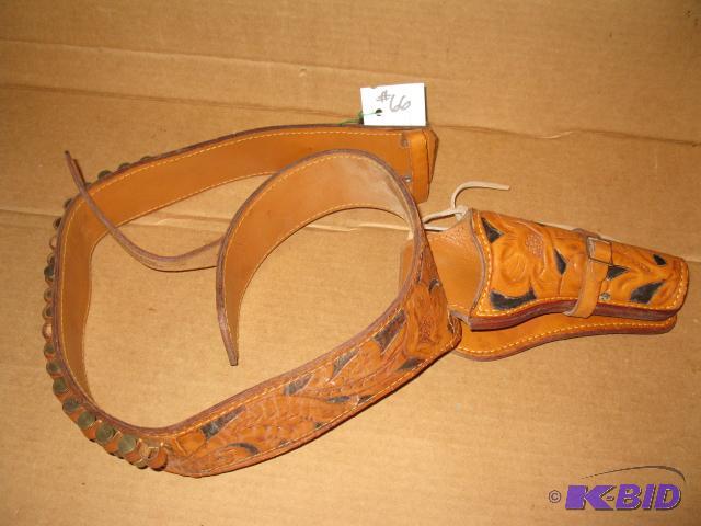 lot 66 image: Hand tooled brown leather holster, Leather Cr...