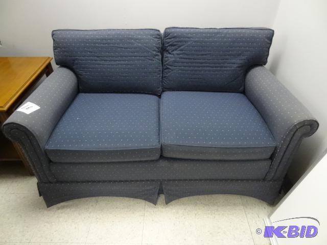 lot 16 image: Cushioned Love Seat. Very Nice Shape. Soverei...