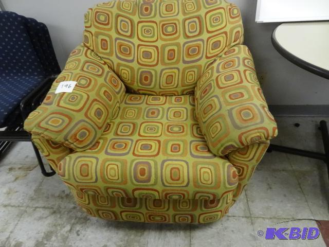 lot 196 image: Cushioned Swivel Sofa Chair...