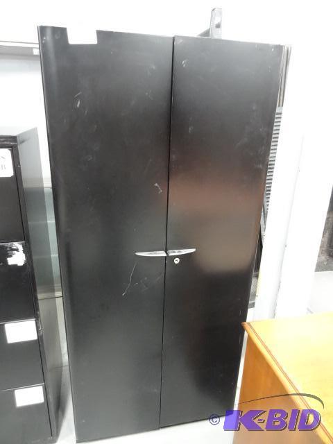 lot 228 image: 2 Door Metal Cabinet. 4 Shelf. 30 X 19 X 65...