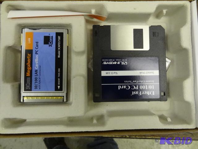 lot 28 image: Ether Fast 10100 PC Card...