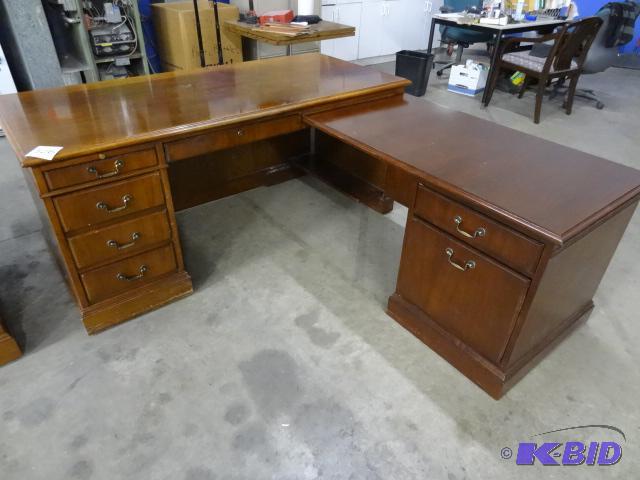 lot 306 image: L shaped Wood Desk. 2 Piece. Lock and Key. 66...