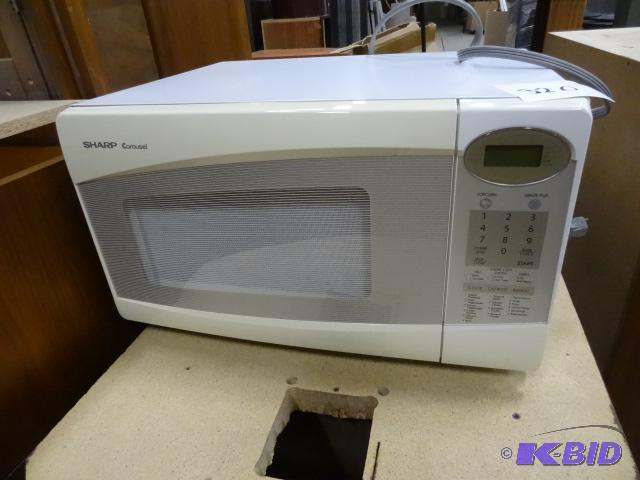 lot 320 image: Sharp Microwave Model R-308JW...