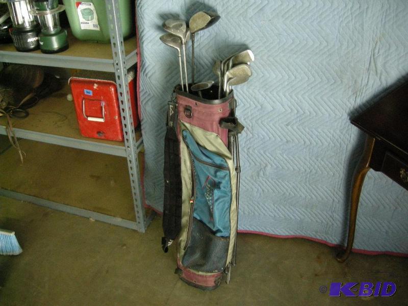 lot 47 image: Delta golf clubs with bag
