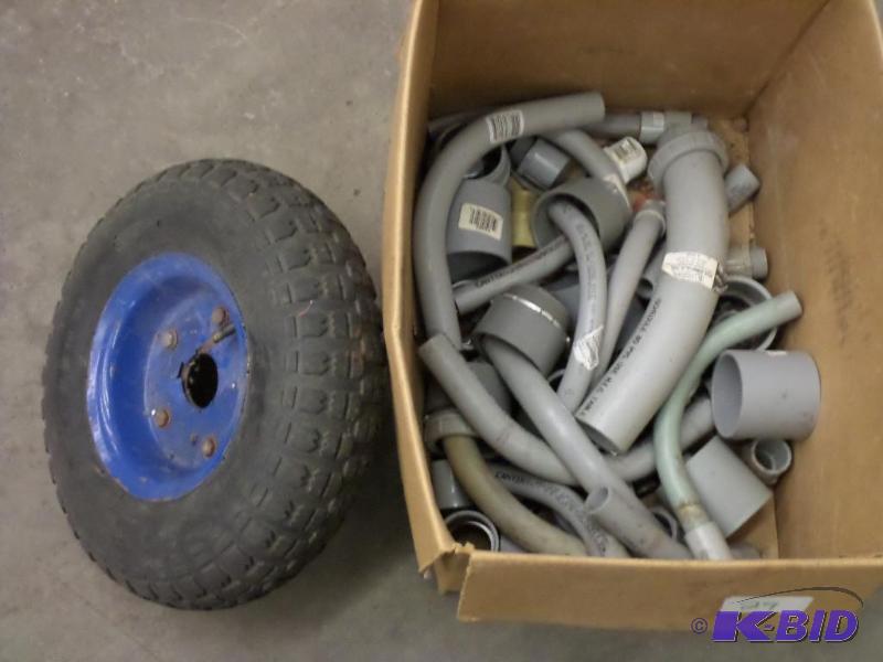 lot 29 image: Box Of Dolly Tire, PVC Pieces & Connecto...
