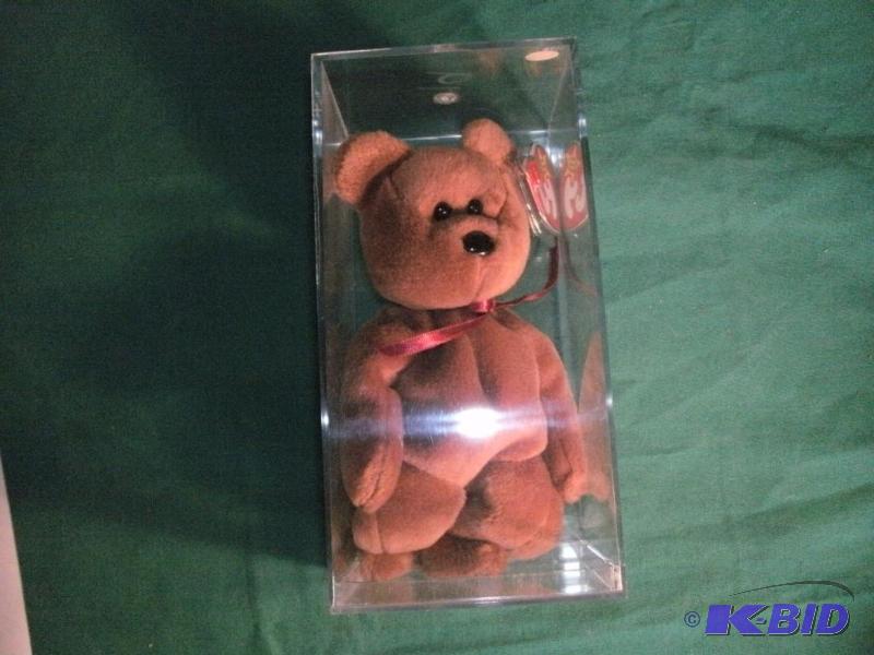 Beanie Baby Teddy in Case. With Swing Tag and...
