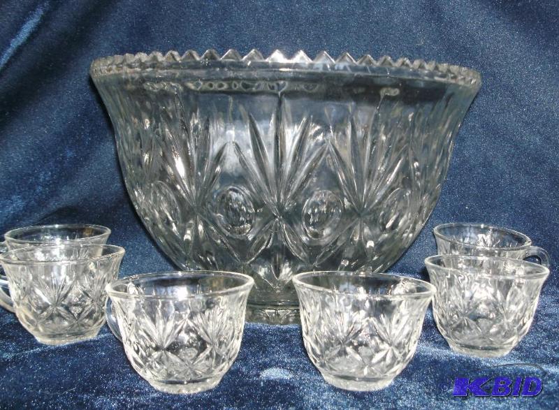 Vintage deep and thick glass punch bowl and 6...