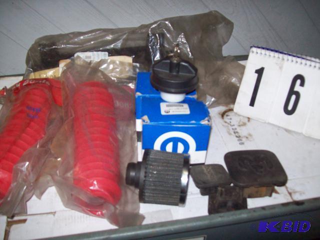 lot 16 image: Auto Parts Lot Locking Gas Caps, Shock Cover...