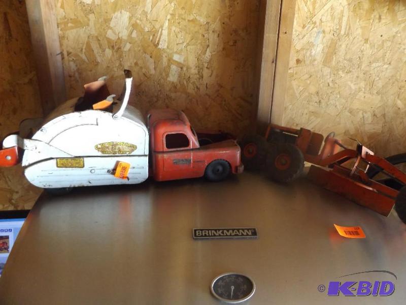 Two vintage metal toys, grader and garbage tr...