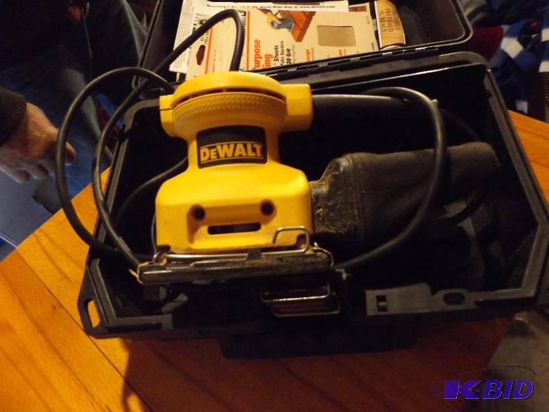 DeWalt Hand Sander with sanding paper...