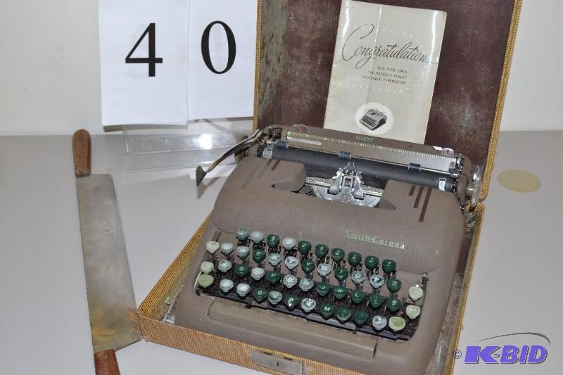 lot 40 image: Typewriter and Knife