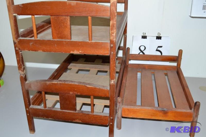 lot 85 image: Vintage Child doll cribs