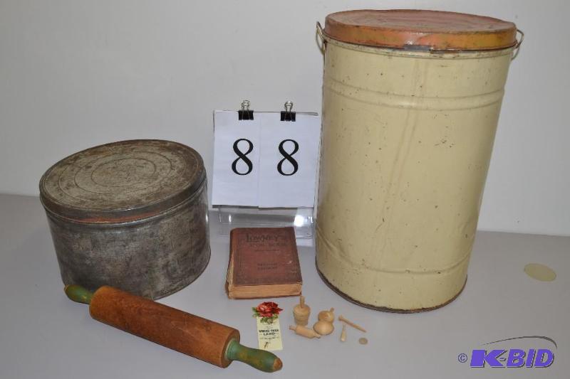 lot 88 image: two round tins, vintage rolling pin, minitures and antique cook book