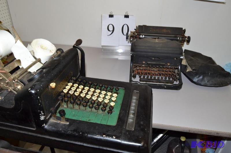 lot 90 image: Antique Burroughs adding machine on metal rolling stang with shelf and Remington typewritter