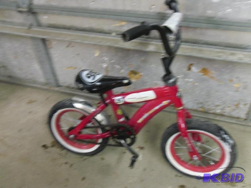 lot 126A image: Cars themed 12.5" kids bike. Has a broke...