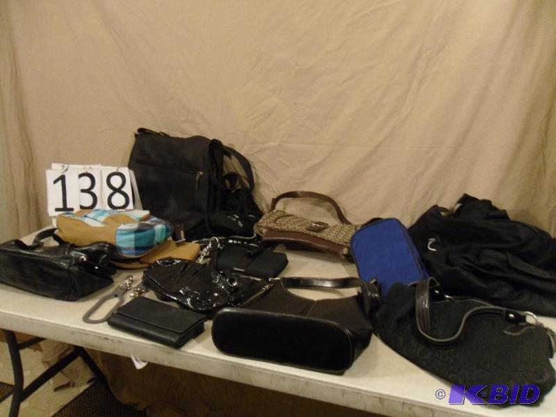 lot 138 image: Lot of Assorted Purses, Wallets, and Bags. On...