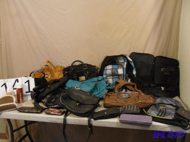 lot 141 image: Lot of Purses, Bags, and Wallets. One is mark...