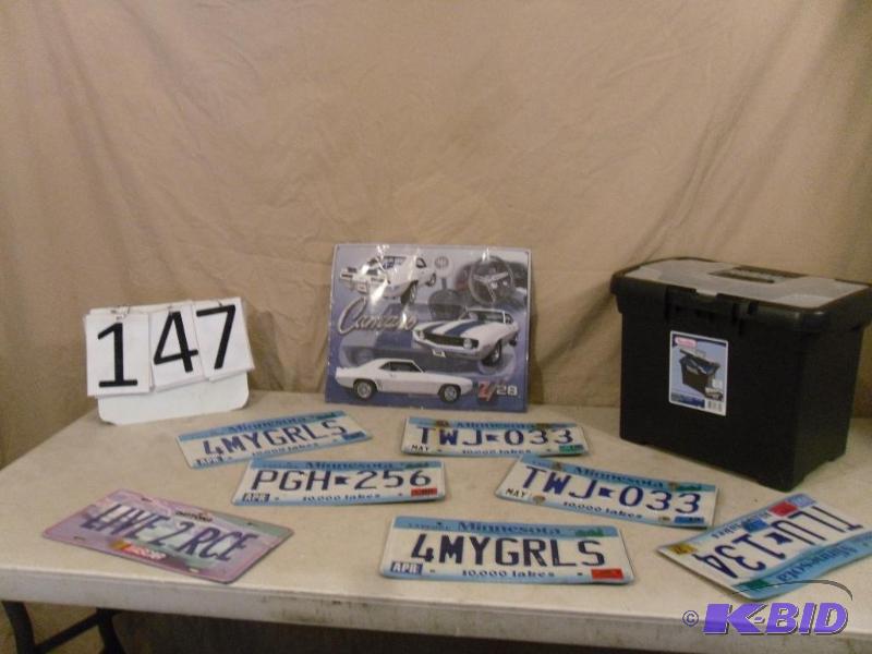 lot 147 image: Lot of License Plates, Metal Sign, and File H...