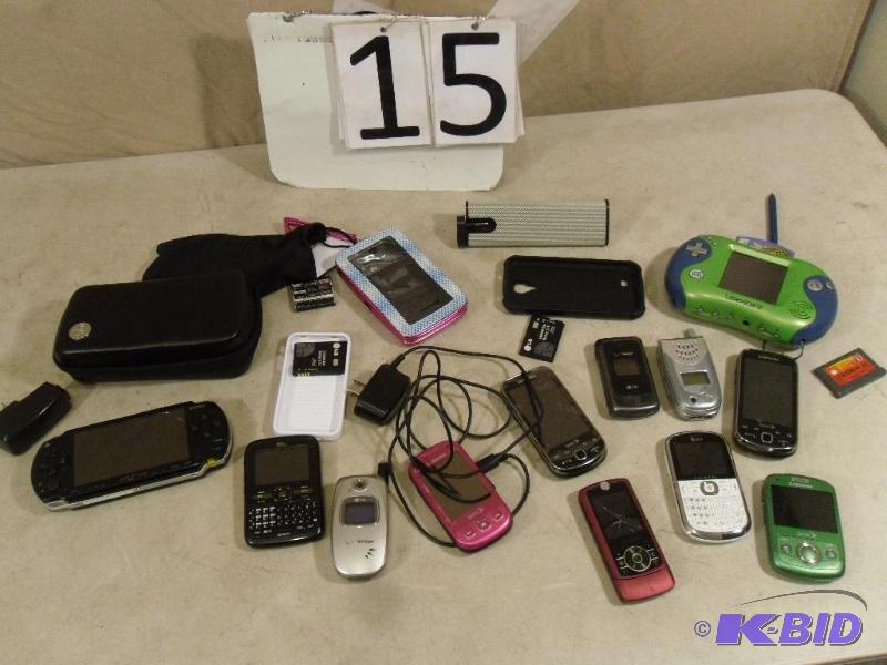 lot 15 image: Cell phones, Sony PSP (cracked screen). Cell ...