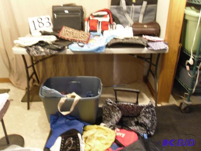 lot 183 image: Large Lot of Purses, Bags, and Wallets. One m...