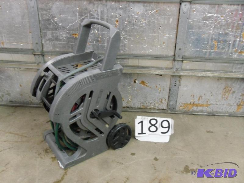 lot 189 image: Portable Hose Reel with Hose. Needs new conne...