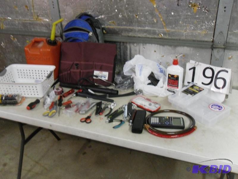 lot 196 image: Tools, Gas Can, Calculator, Partial Lighter F...