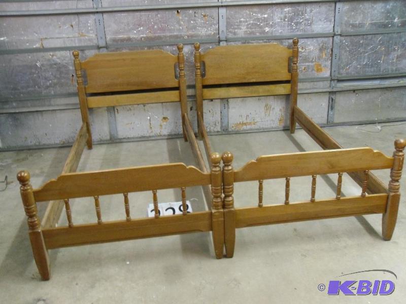 lot 228 image: 2 Matching Twin Beds
