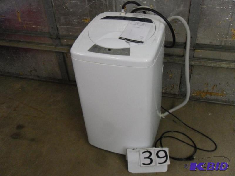 lot 39 image: Haier&nbspCompact Portable Clothes Washing M...
