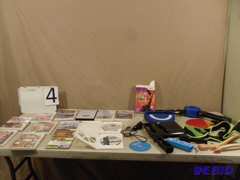 lot 4 image: Lot of Assorted Wii Games and Accessories. Zu...