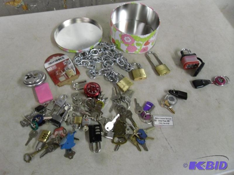lot 51B image: Assorted keys, locks, keychains, etc. Some of...