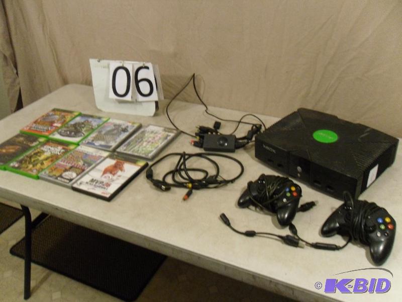 lot 6 image: Xbox Game console, video cords (no power cord...