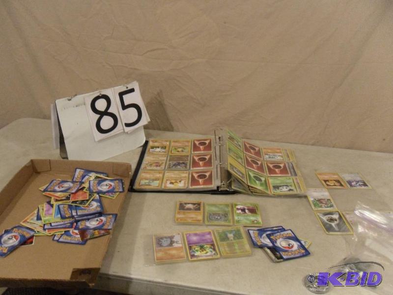 lot 85 image: Lot of Assorted Pokeman Cards and Pewter Spon...