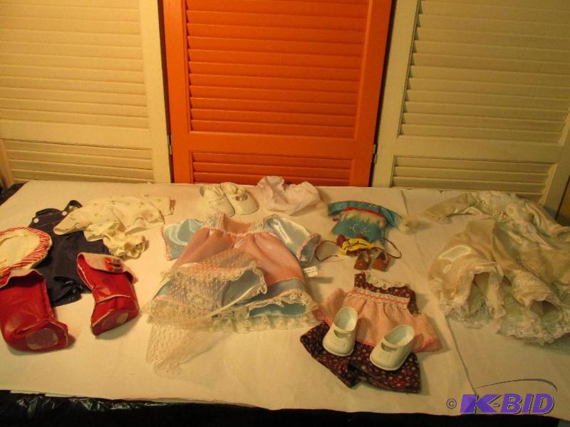 lot 23 image: Large Lot of Vintage Doll Clothes