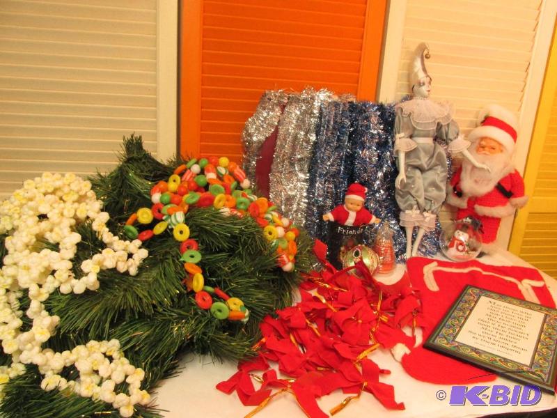 lot 40 image: Large Lot of Christmas Decor   Porcelain Clown Doll  Many Feet of Garland