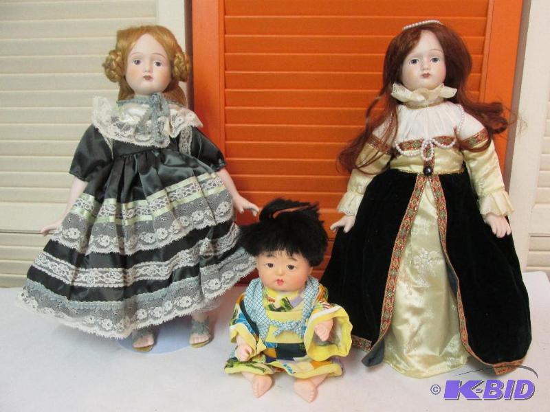 lot 53 image: A Trio of Adorable Dolls