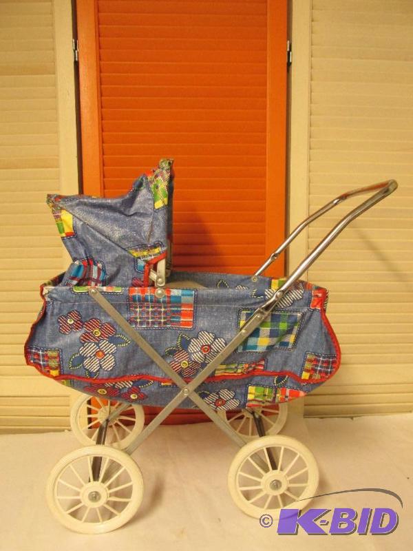 lot 8 image: Vintage Doll Buggy - Bright Colors