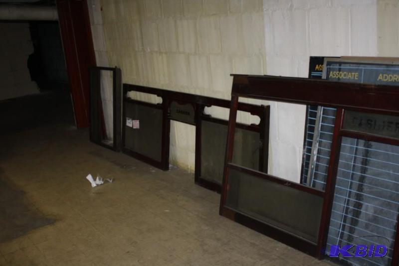 lot 1043 image: Vintage Cashier Desk wGrated Windows & Original Glass Sign Windows